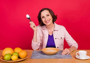 A woman eating oatmeal