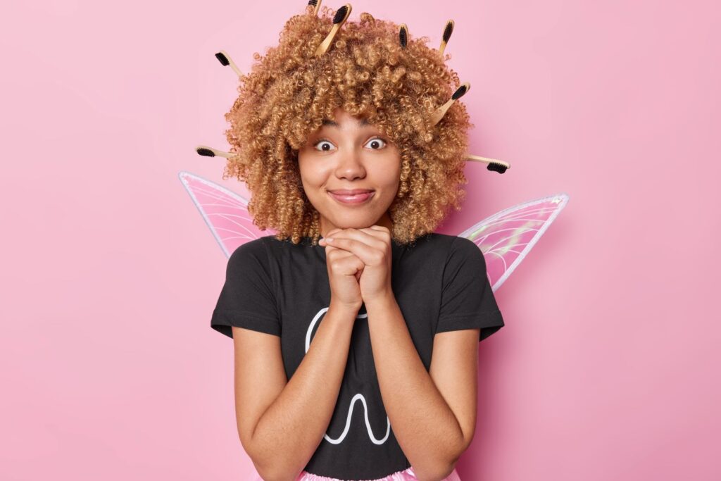 A woman in a tooth fairy costume.